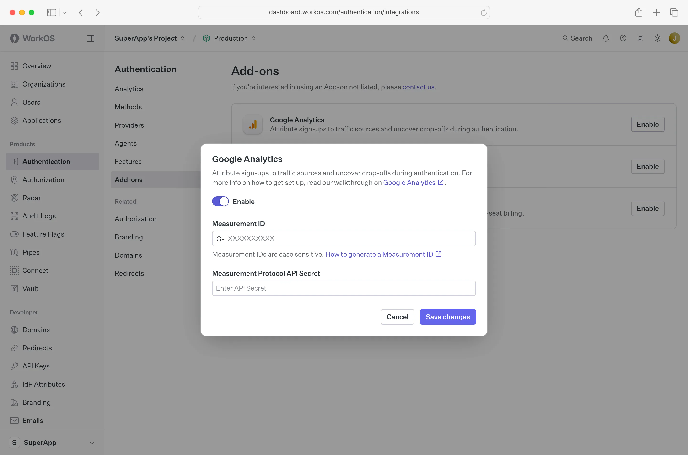 Google Analytics modal with Measurement ID and Measurement Protocol API Secret fields in the WorkOS Dashboard