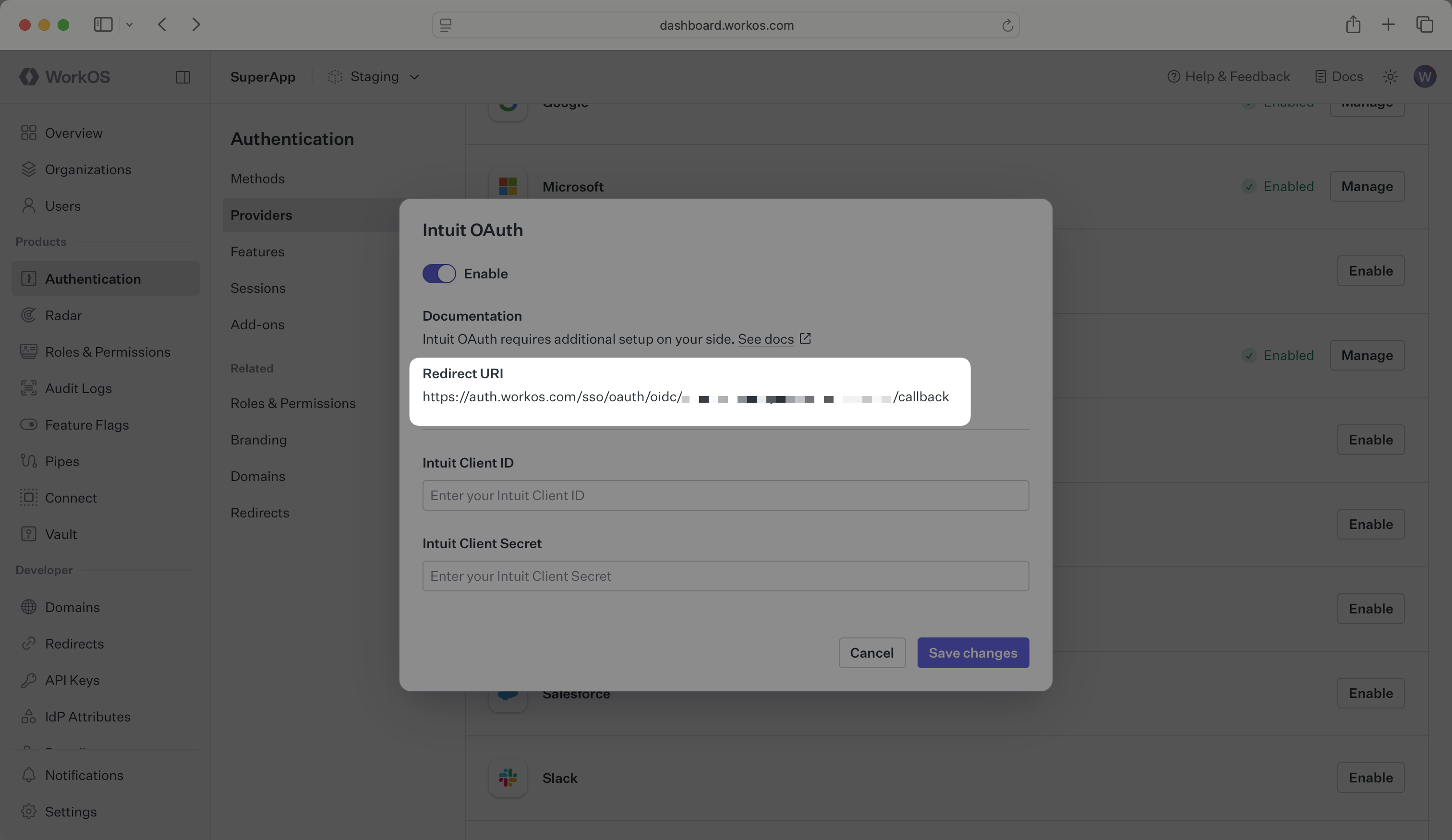 The Intuit OAuth configuration modal in the WorkOS Dashboard
