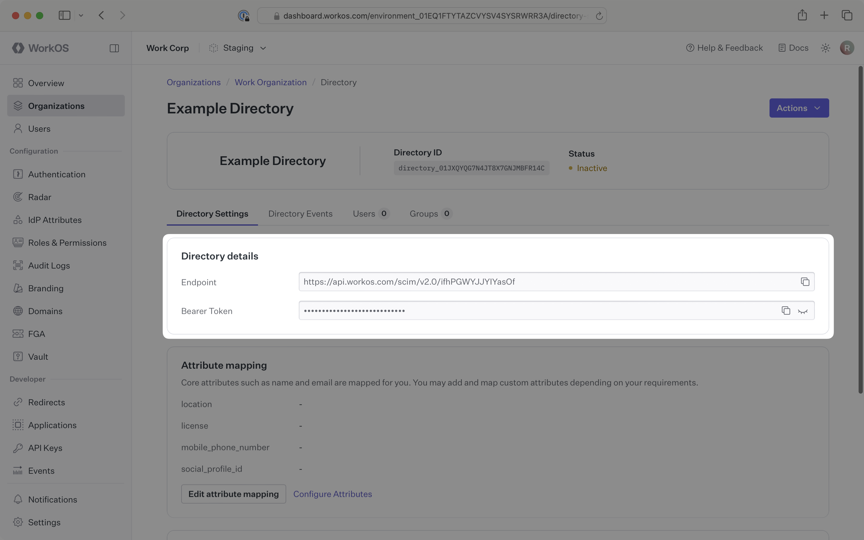 The WorkOS dashboard, highlights the directory details card with filled endpoint and bearer token inputs
