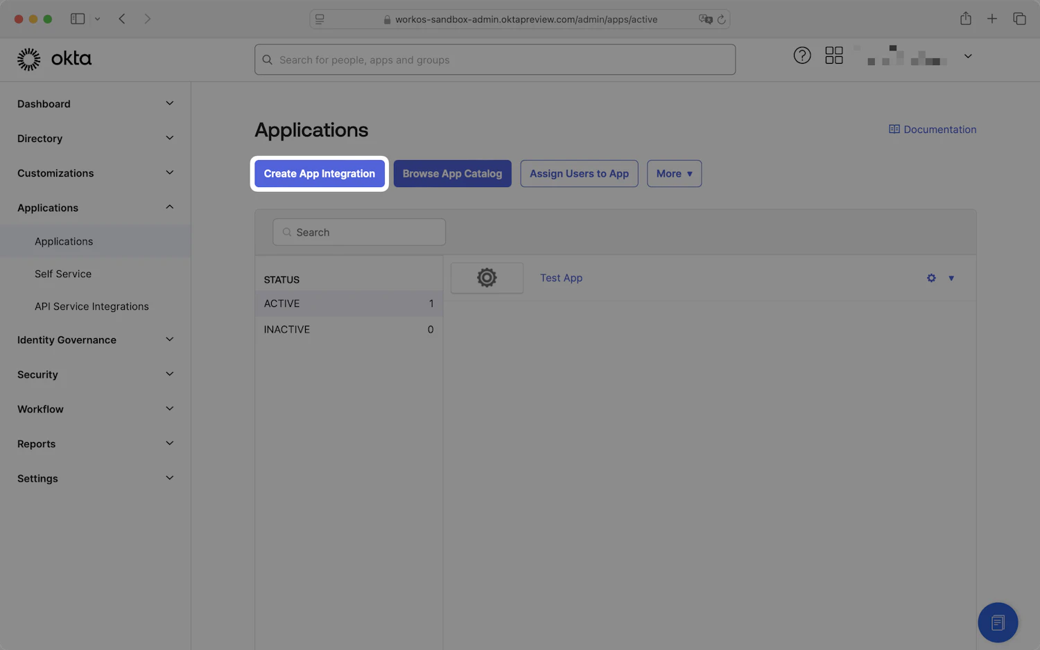 A screenshot showing how to select "Create App Integration" in the Okta Dashboard.