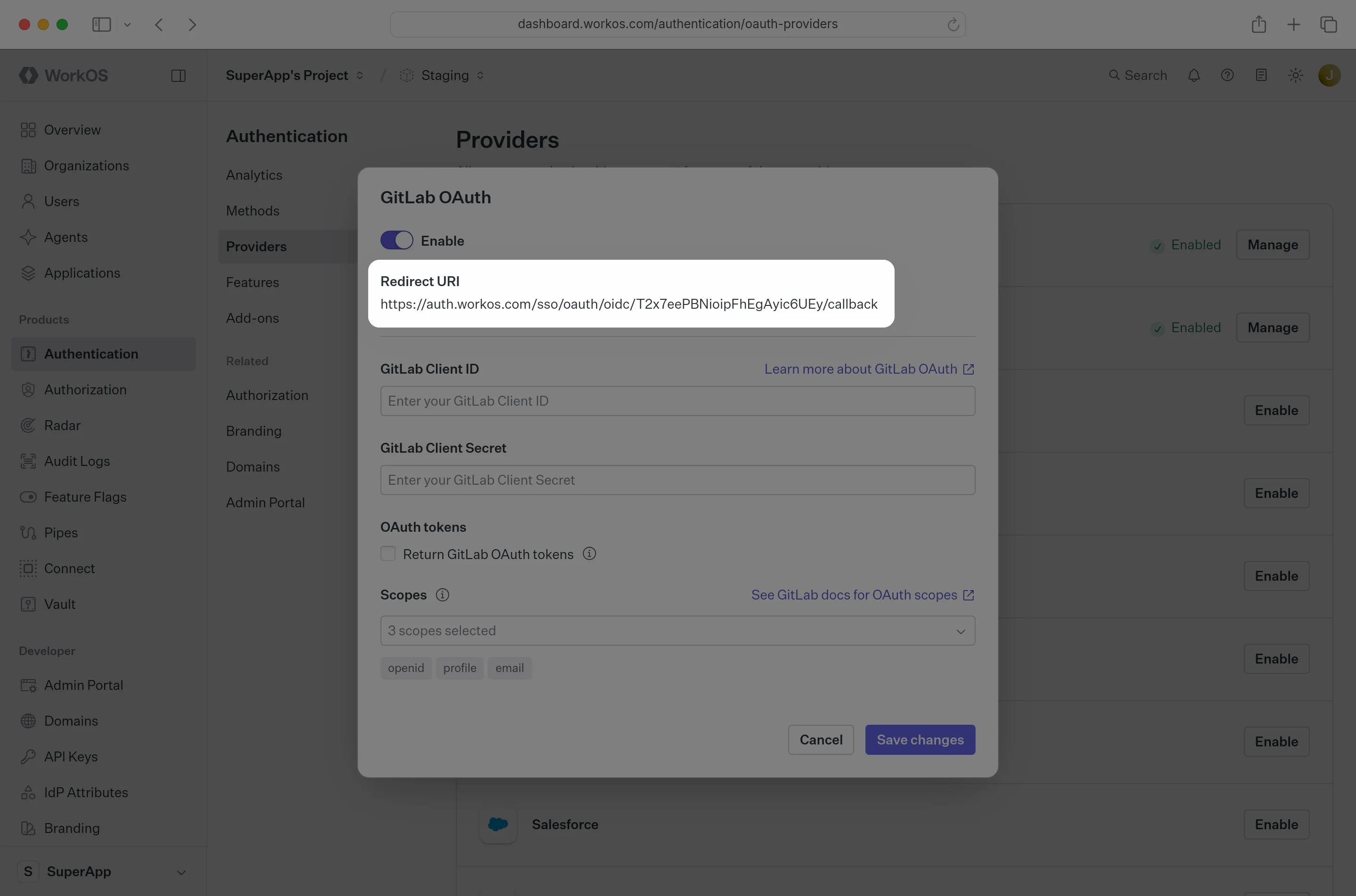 The GitLab OAuth configuration modal in the WorkOS Dashboard
