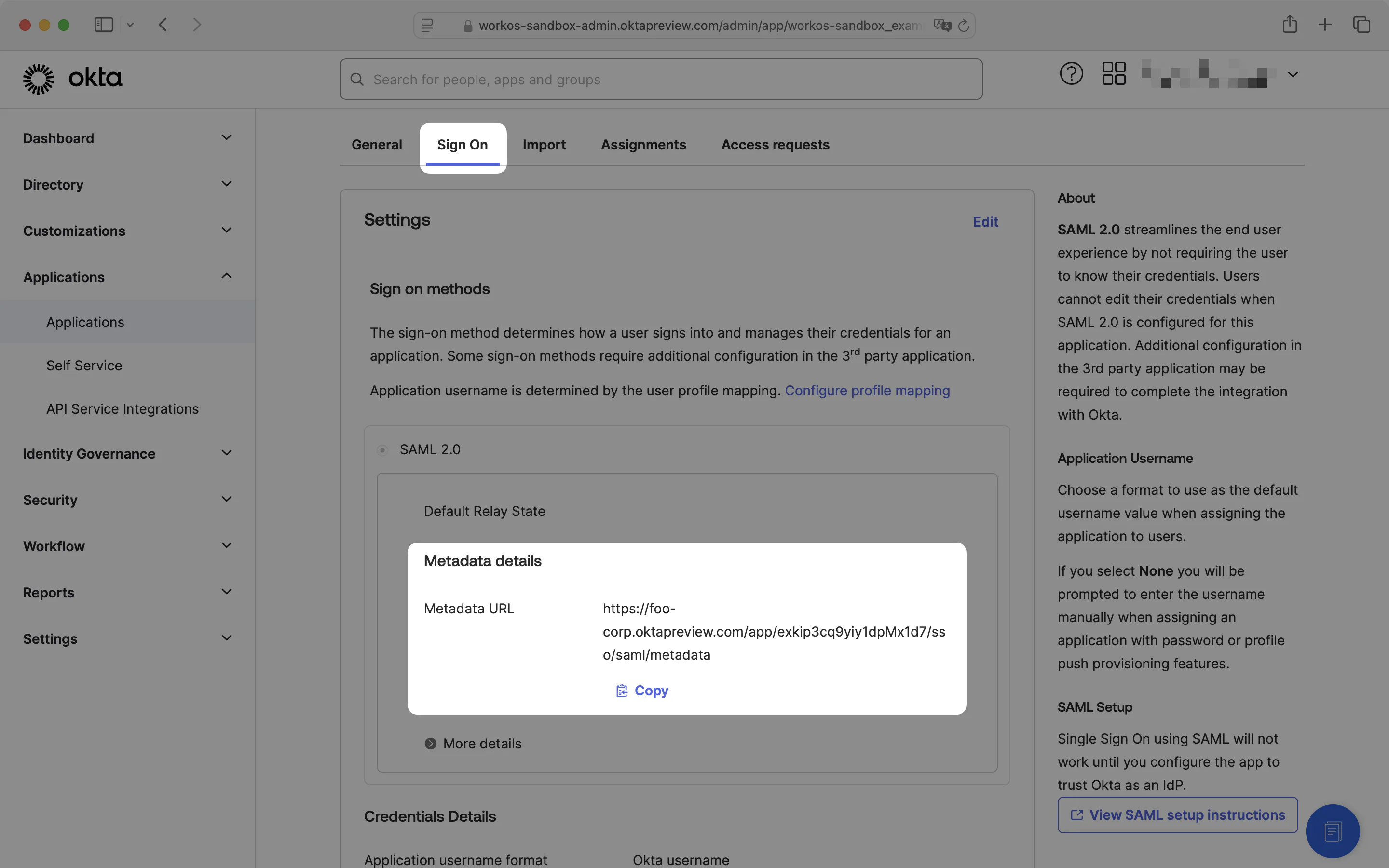 A screenshot showing where to find the Metadata URL on the "Sign On" tab in the Okta Dashboard.