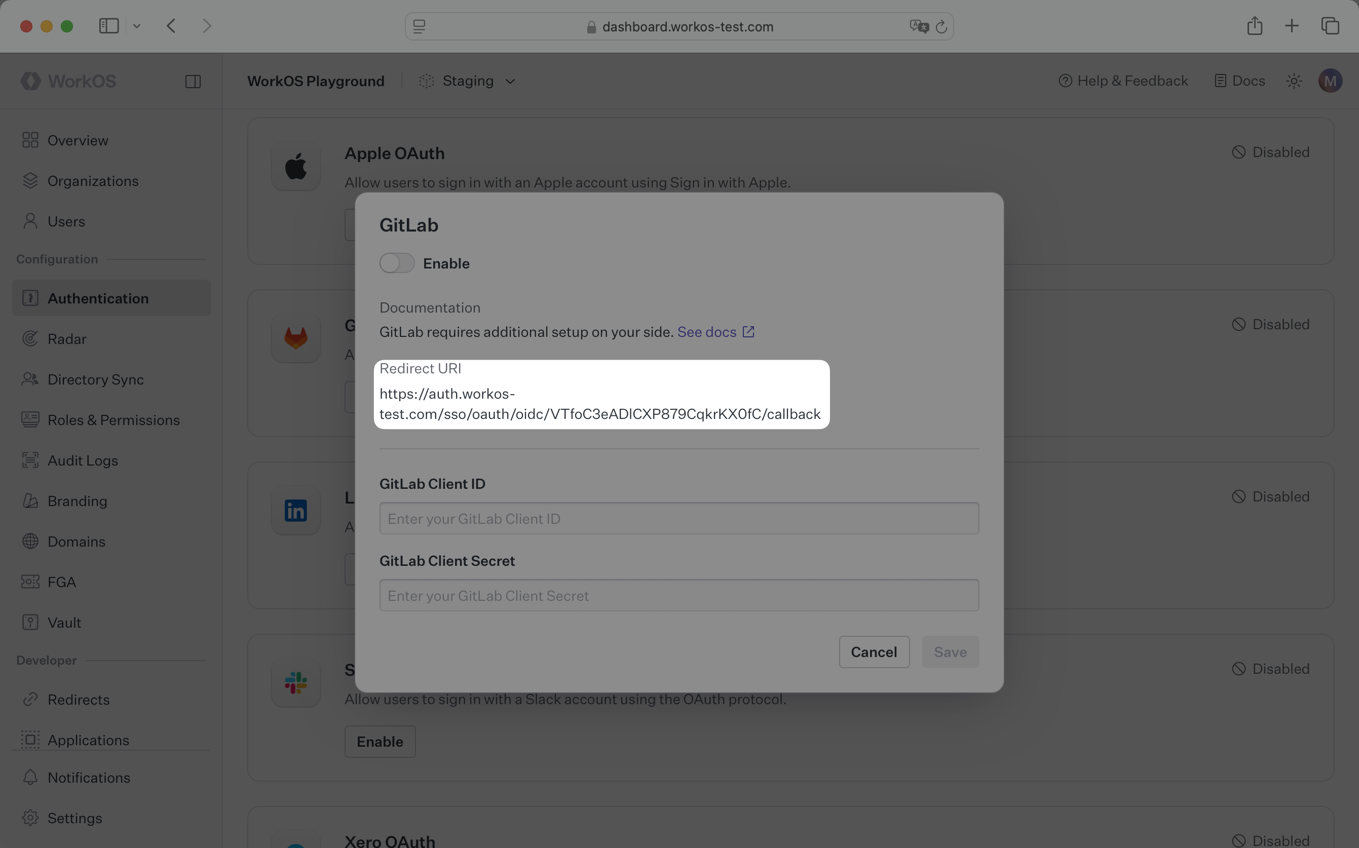 A screenshot showing the GitLab OAuth configuration modal in the WorkOS Dashboard.