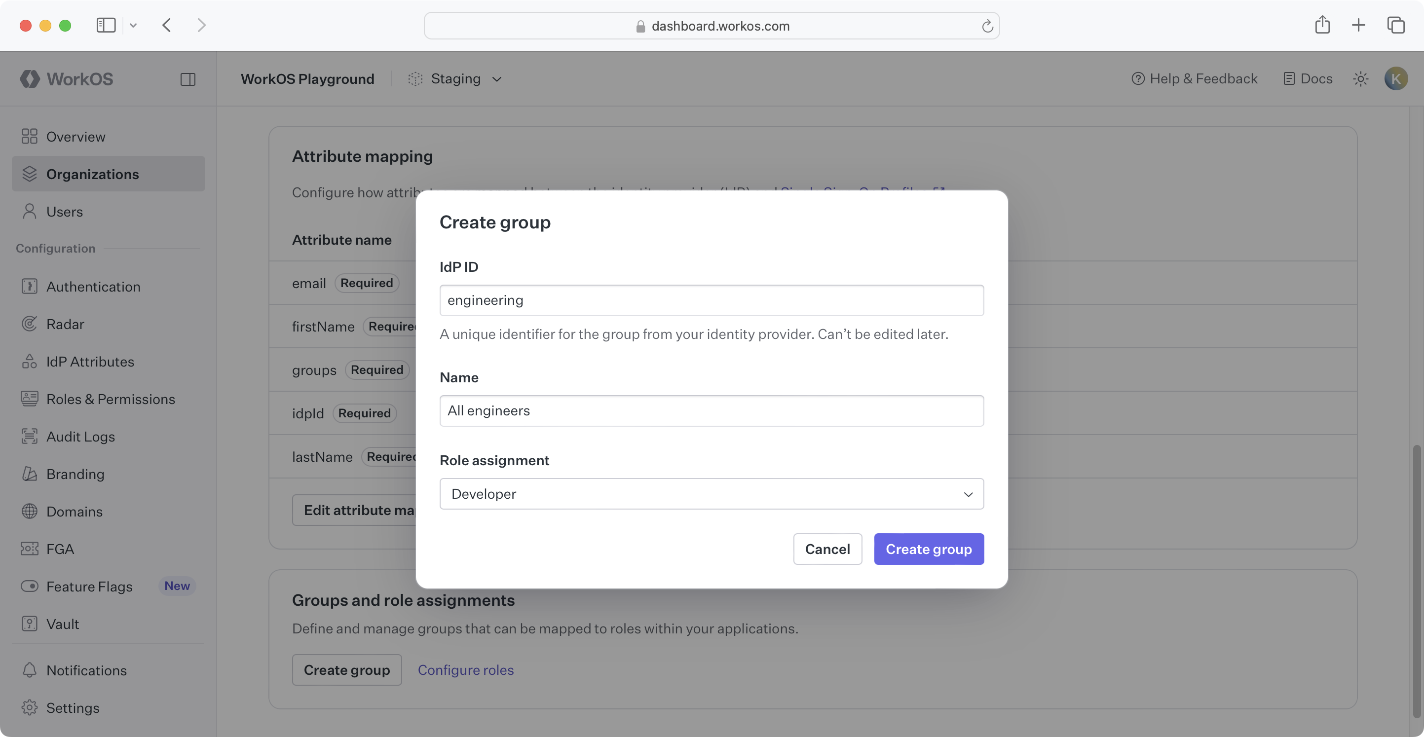 WorkOS dashboard with open create group dialog and idp_id, name, and role assignment inputs